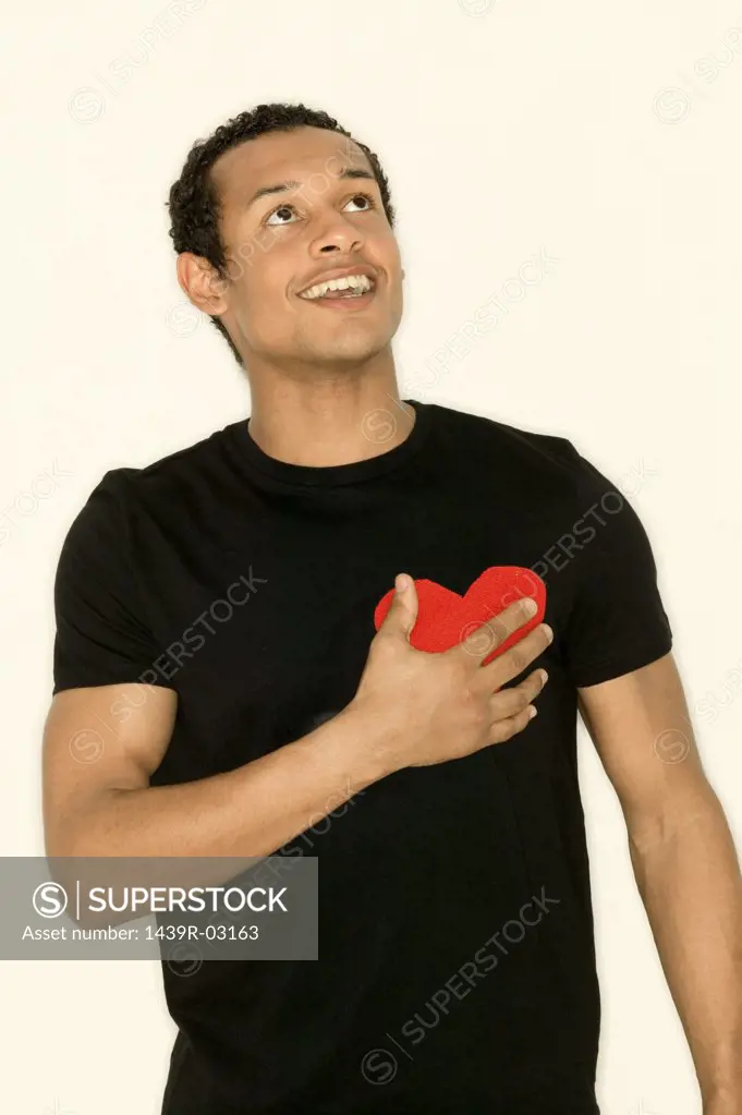 Man with heart shape on t-shirt