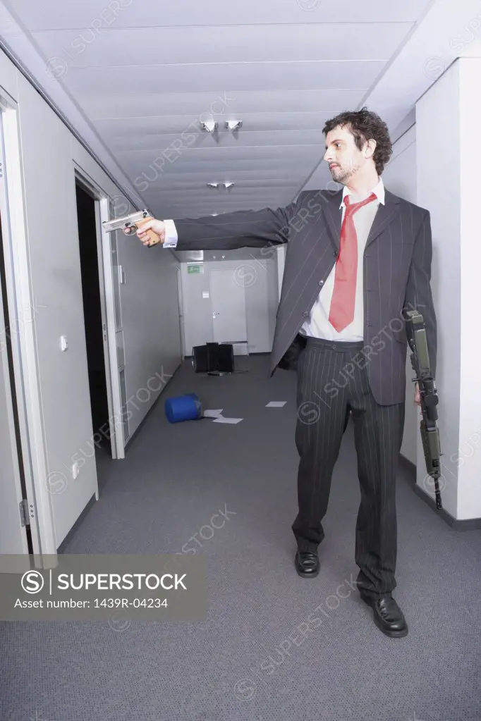 Businessman using a handgun