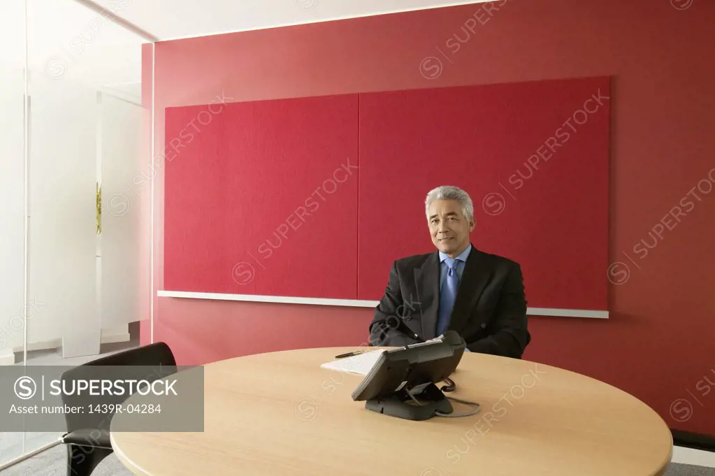 Asian businessman in office