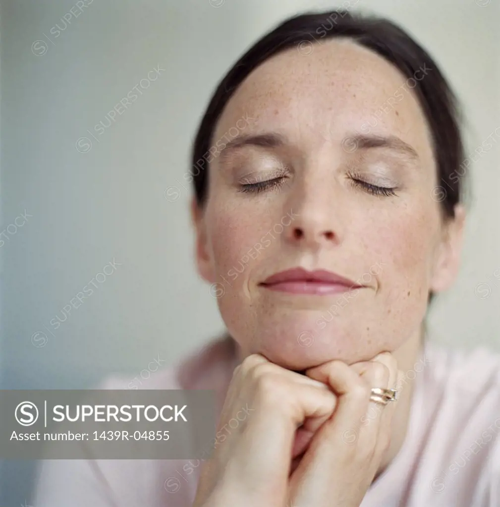 Portrait of woman with eyes closed