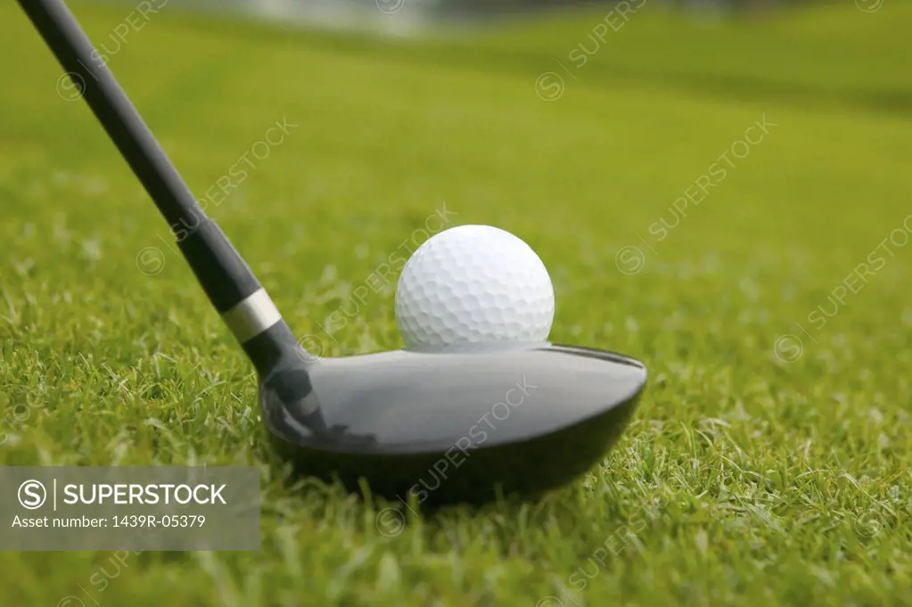Golf ball and putter