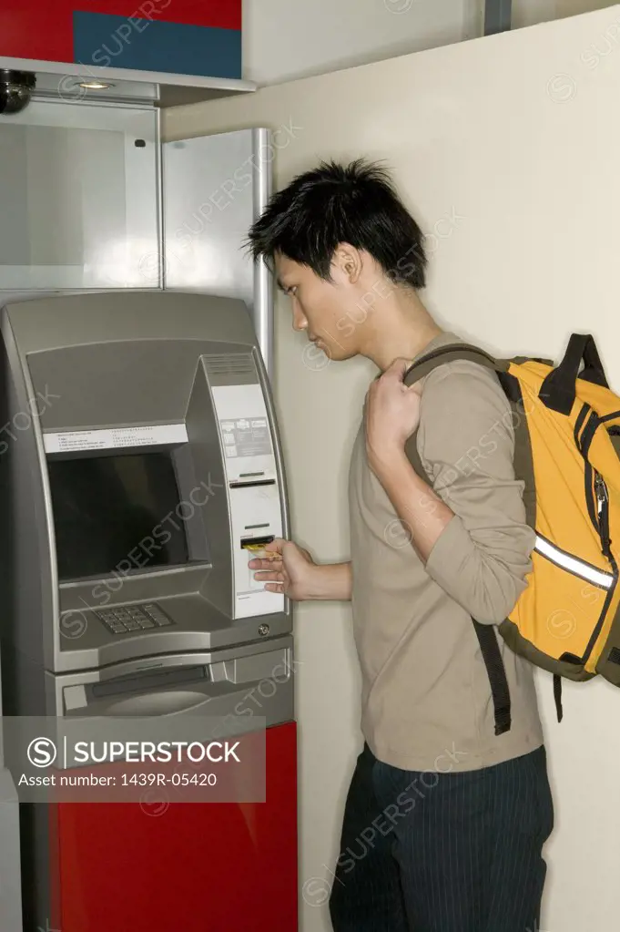 Man using a cash machine