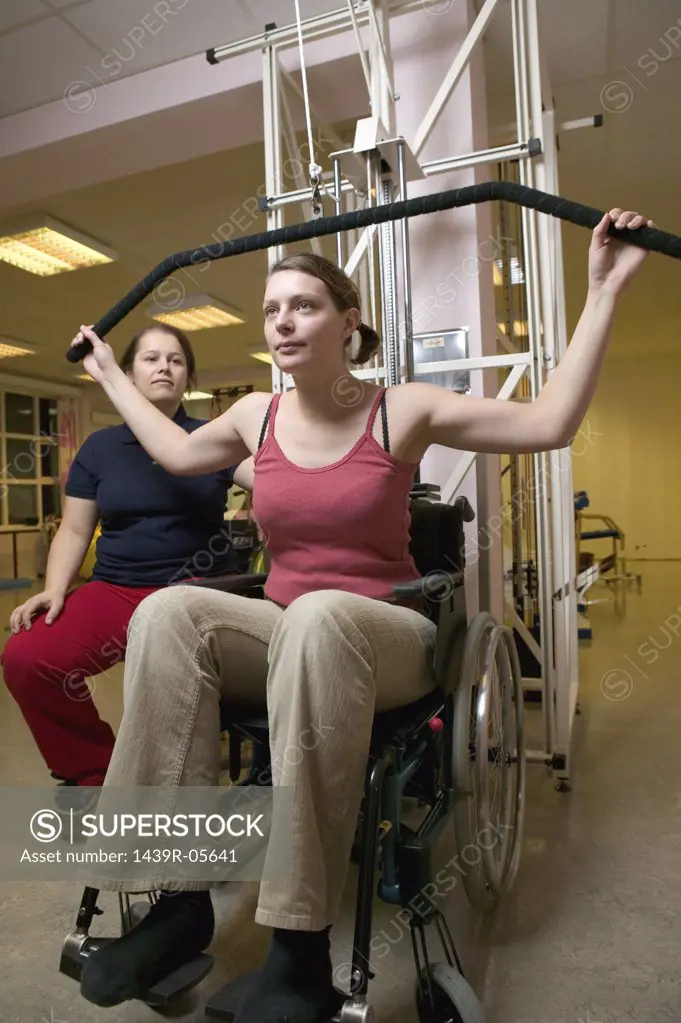 Disabled woman weight lifting