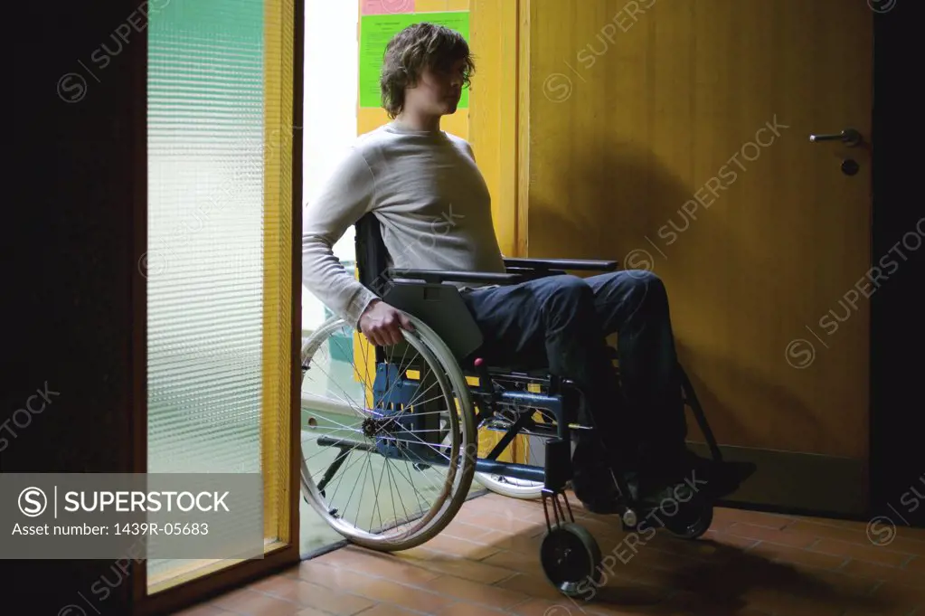 Disabled man in doorway