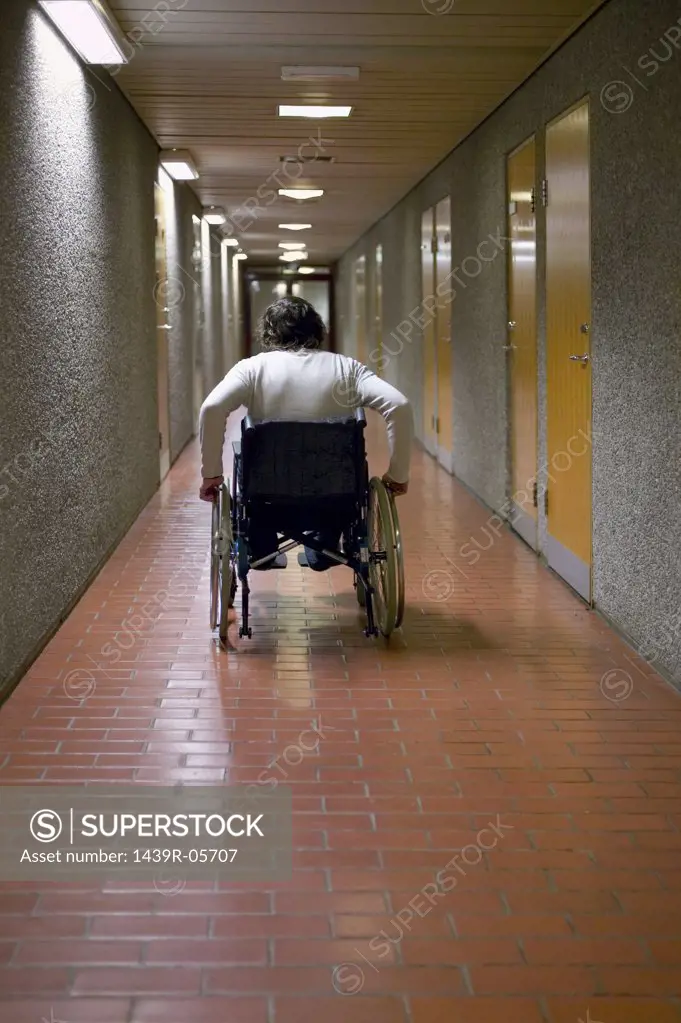 Disabled man in corridor