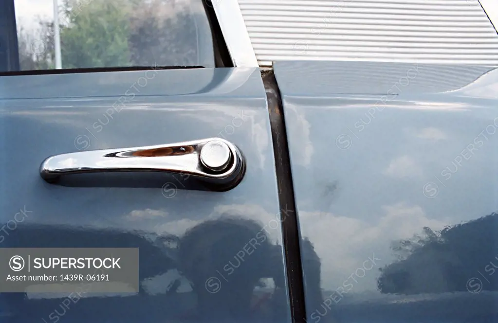 Close-up of vintage car door handle