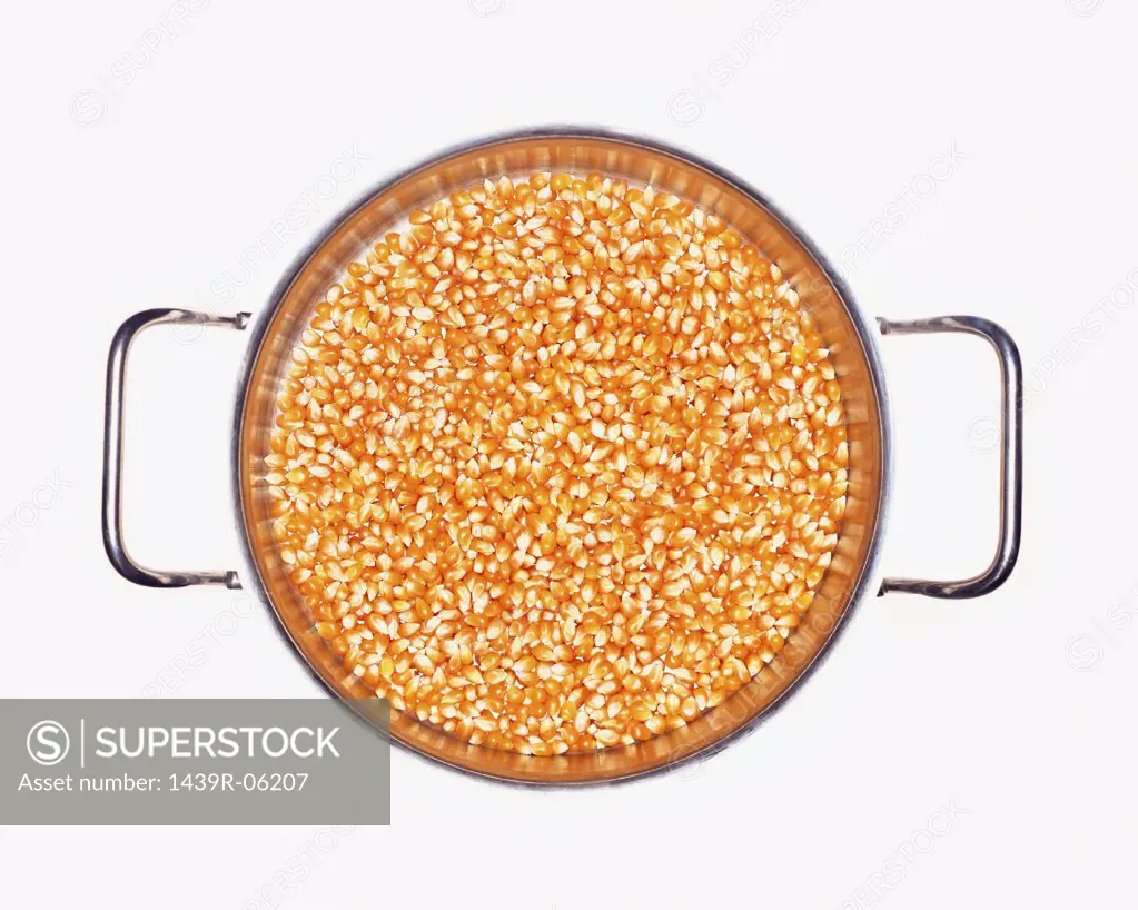 Popcorn kernels in a metal bucket