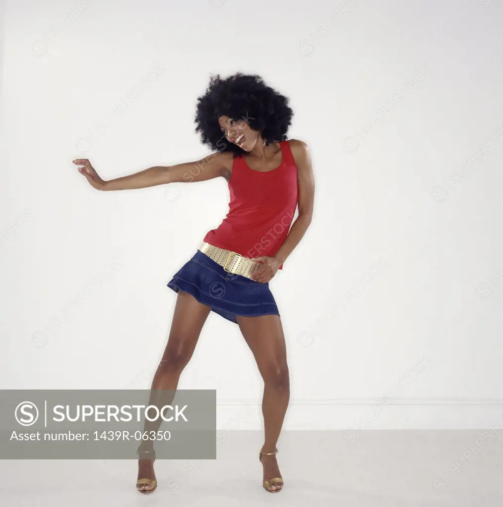 Woman with afro dancing