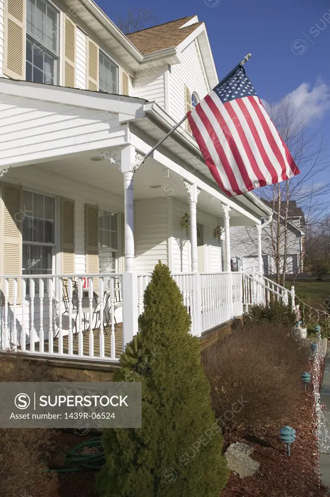 American flag outside house