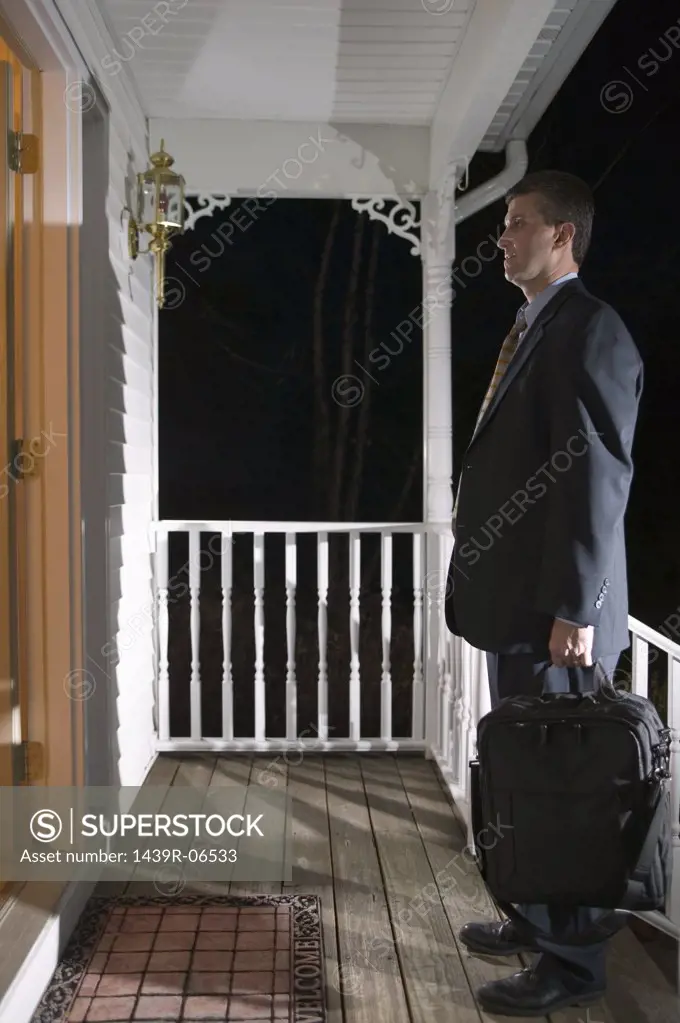 Businessman arriving home
