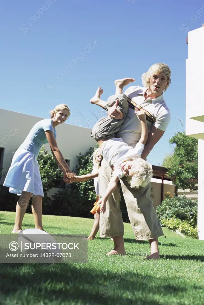 Family playing in garden