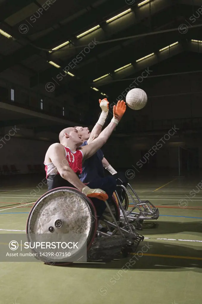 Disabled man playing basketball