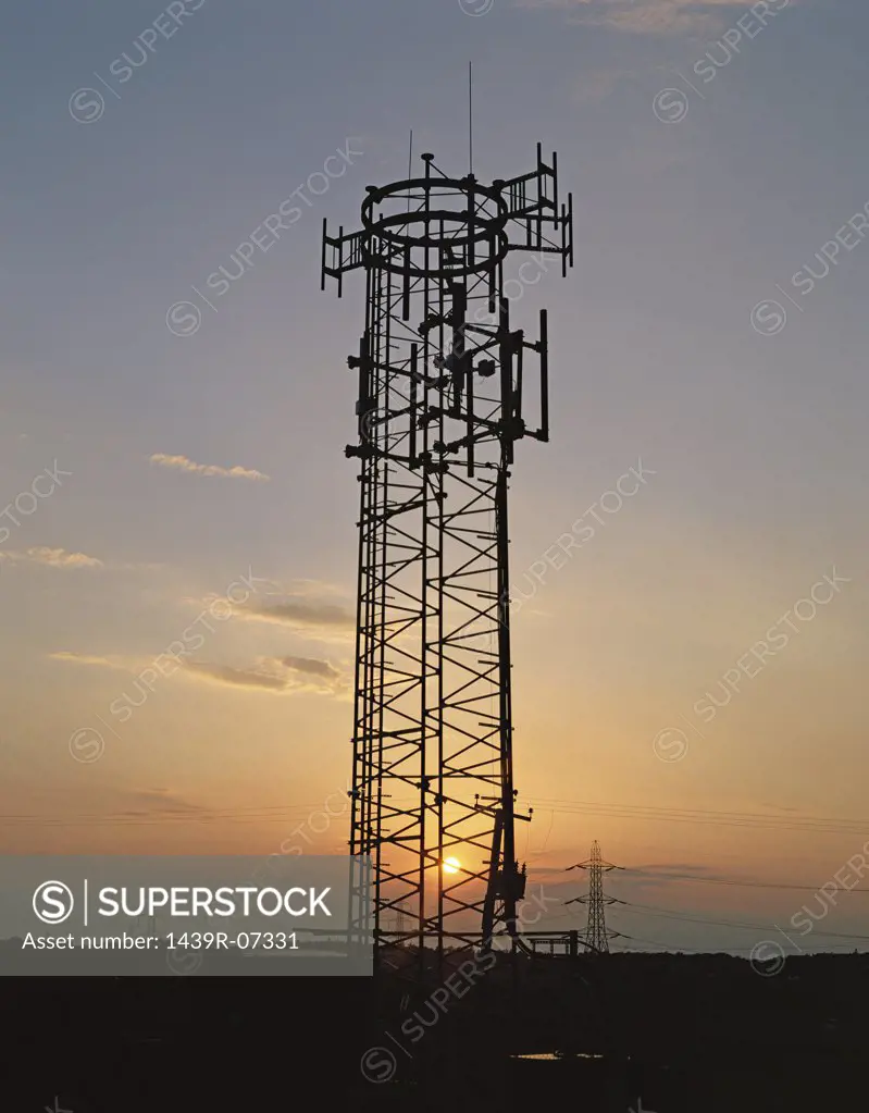 Mobile phone mast at sunset