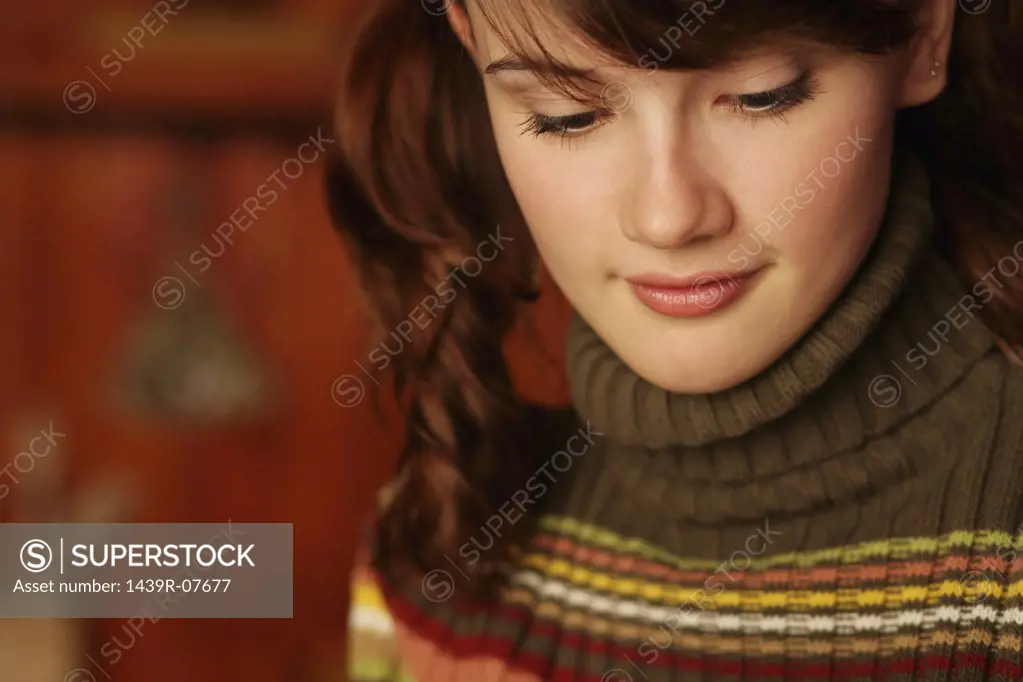 Young woman in roll neck sweater