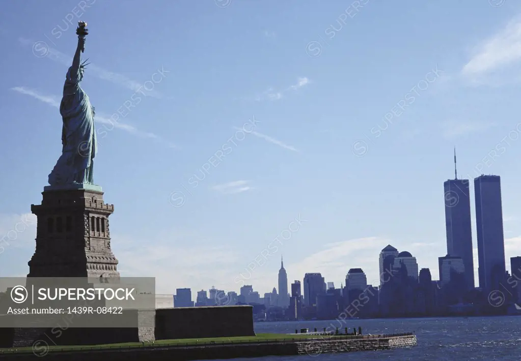 Statue of Liberty with view of Manhattan