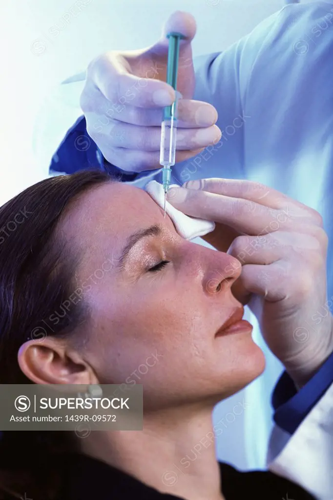 Woman having botox injections