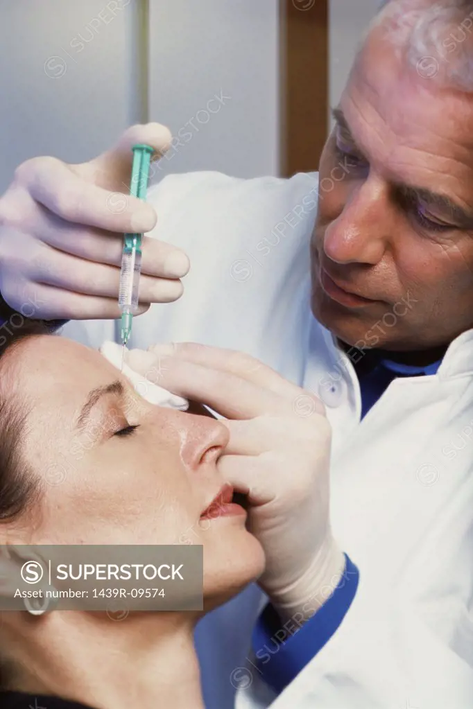 Woman having botox injections