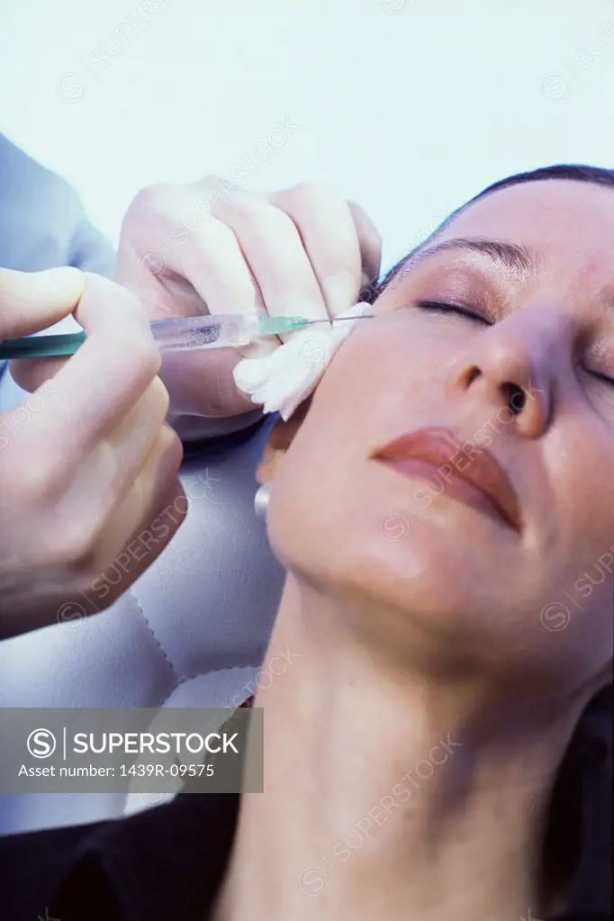 Woman having botox injections