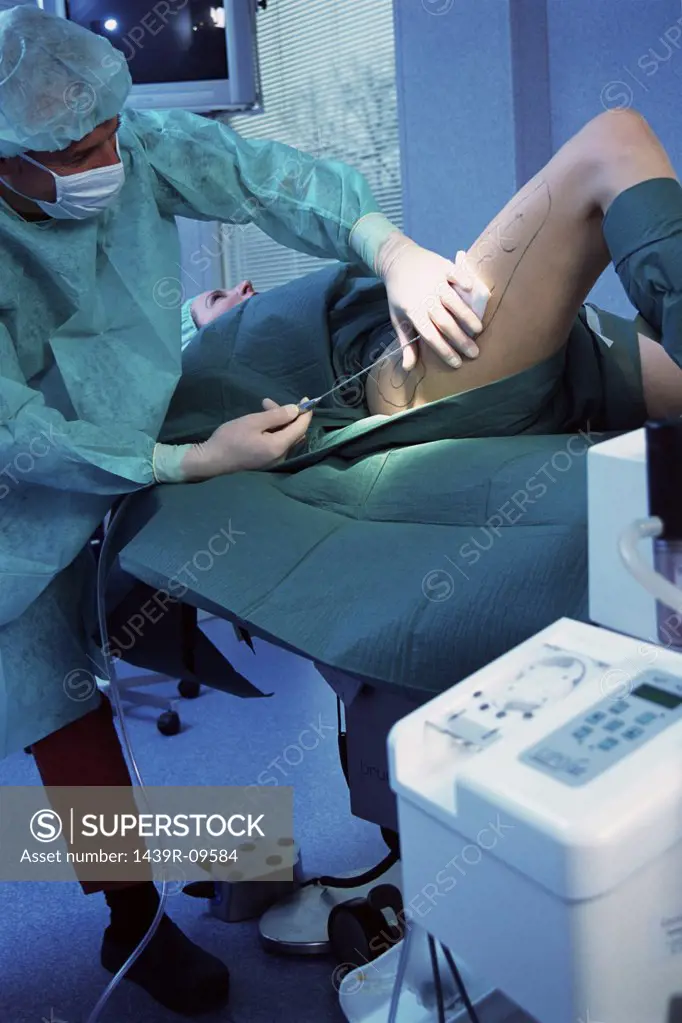 Woman having liposuction