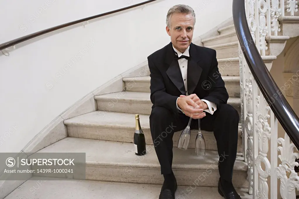 Man in tuxedo with champagne