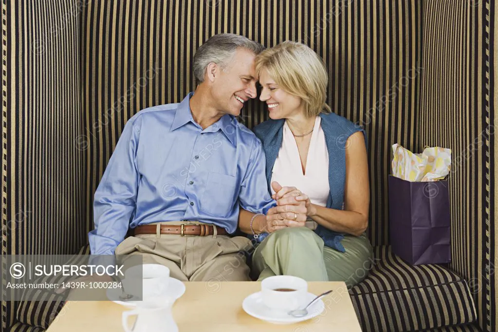 Loving couple having coffee