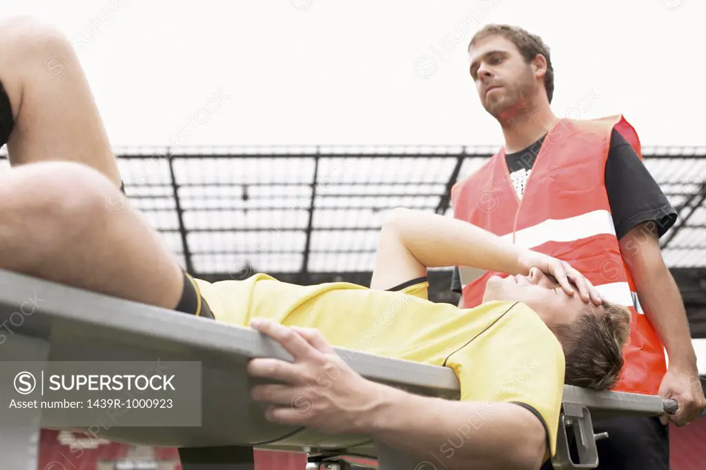 Footballer on a stretcher