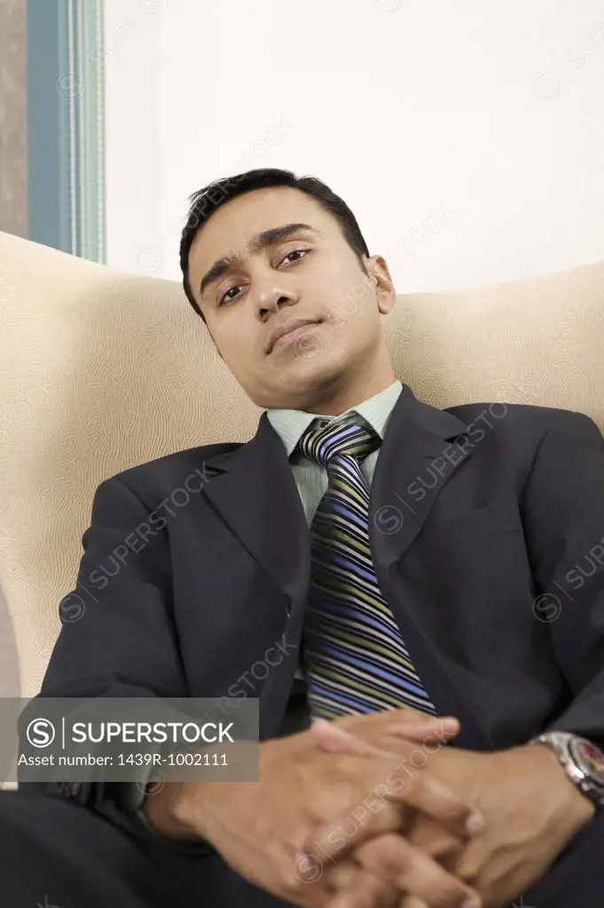 Businessman sitting in chair