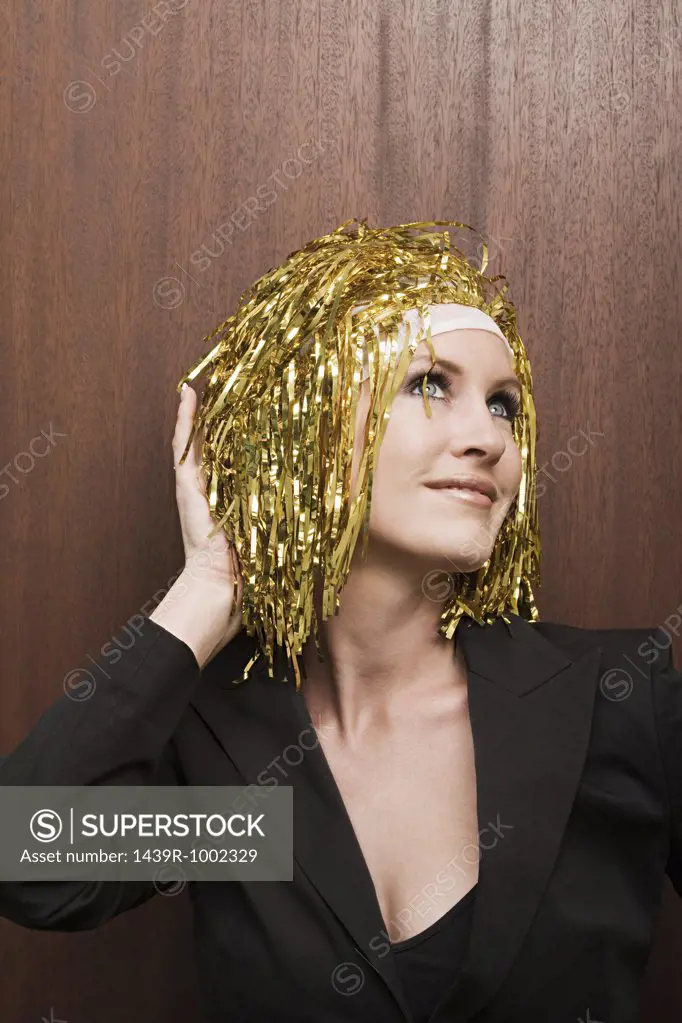 Woman wearing gold colour wig