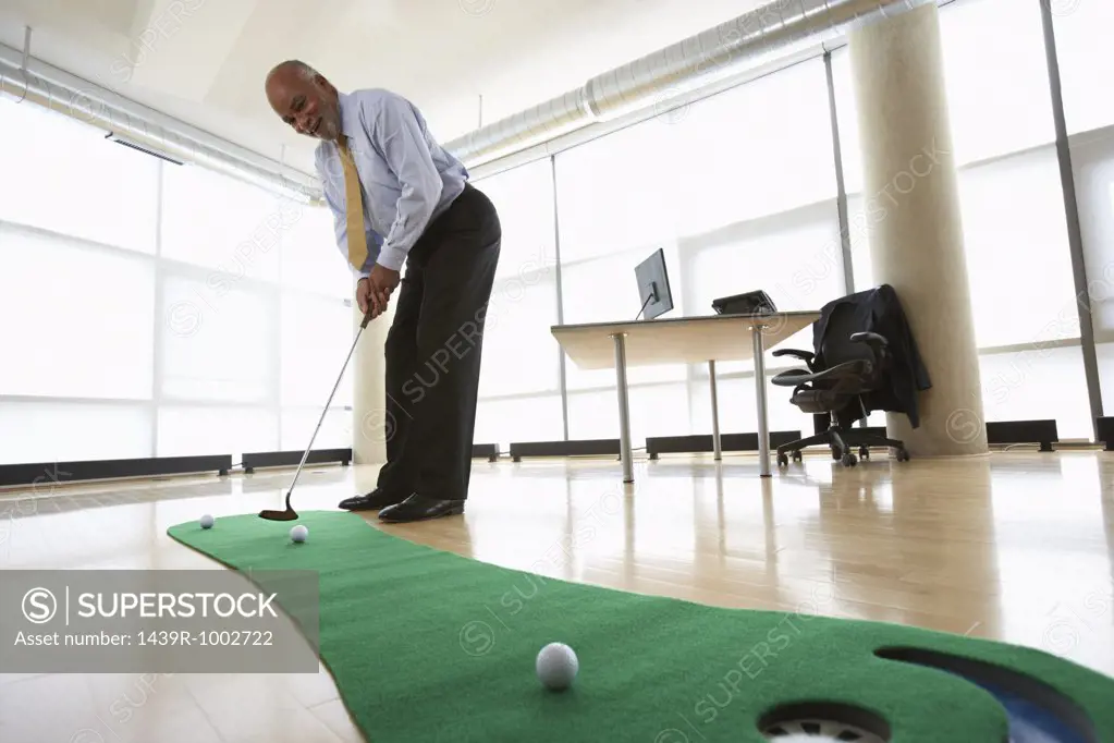 Ceo practicing putting