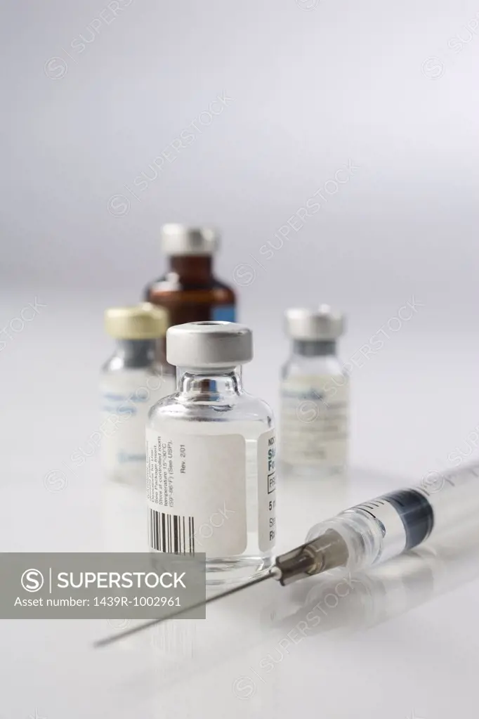 Syringe and three phials