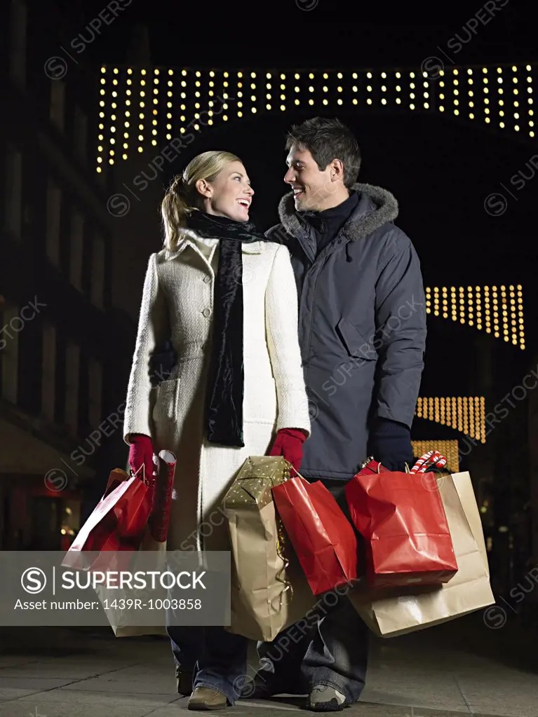 Mid adult couple christmas shopping