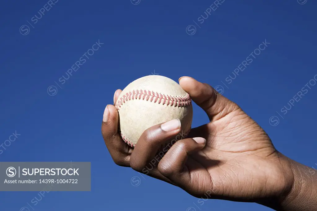 Teenage boy about to throw a baseball
