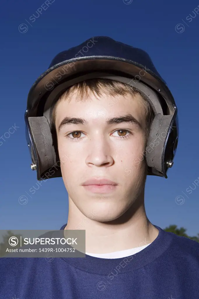 Portrait of a teenage boy wearing a helmet