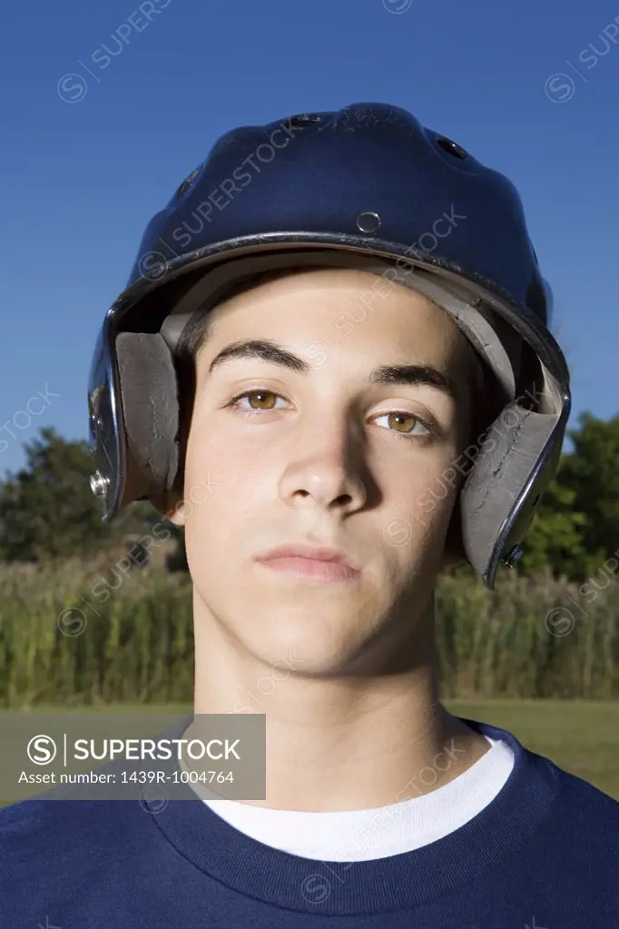 Portrait of a teenage boy wearing a helmet