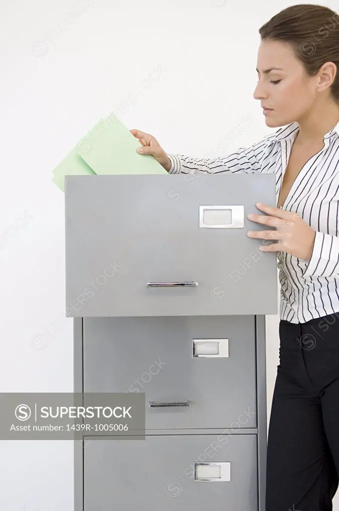 Businesswoman filing