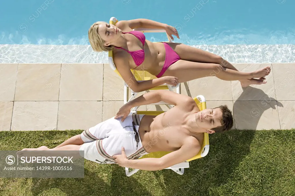 Couple sunbathing