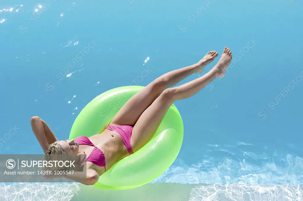 Young woman in pool