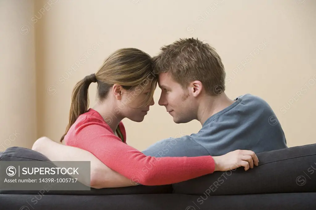 Couple touching foreheads