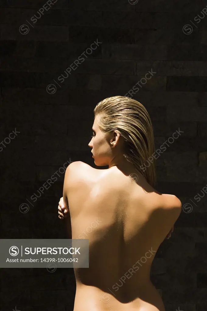 Rear view of naked woman