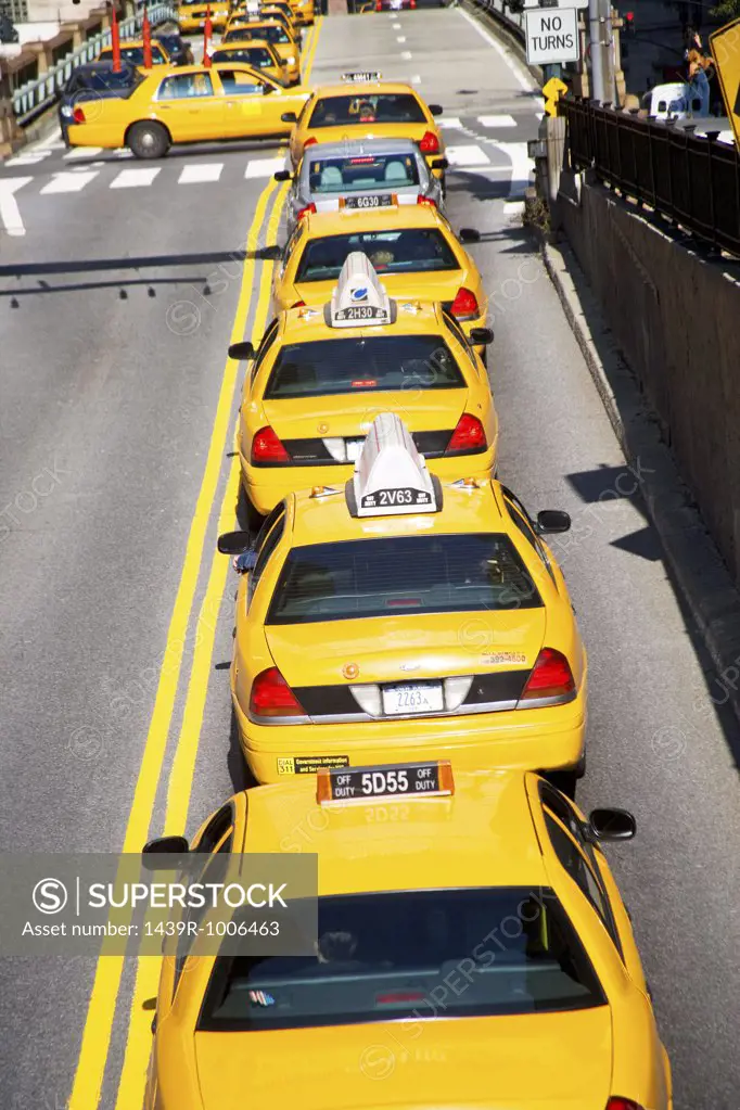 Queue of yellow taxi cabs new york