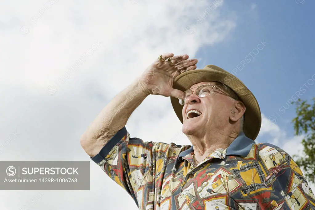 Senior adult man gazing into the distance