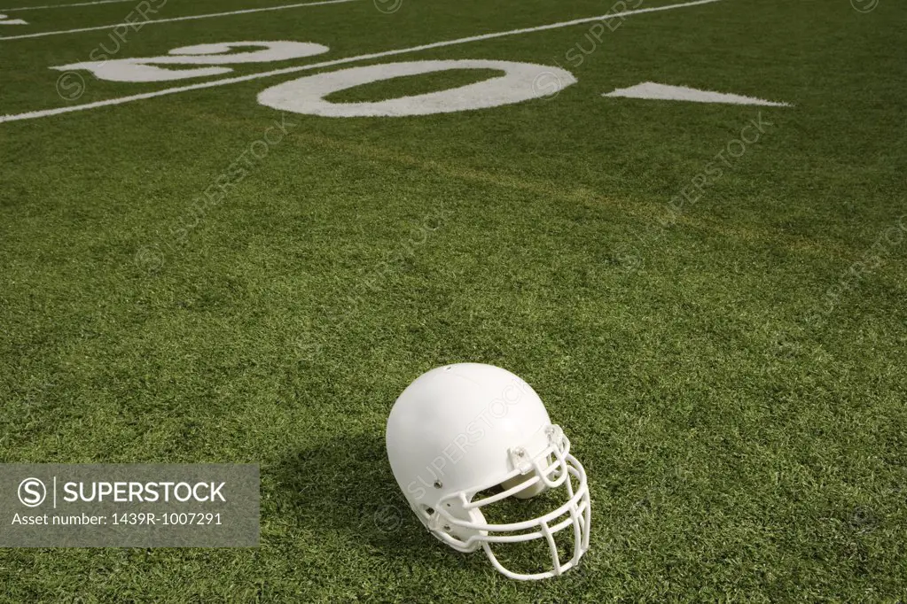 Helmet on american football field