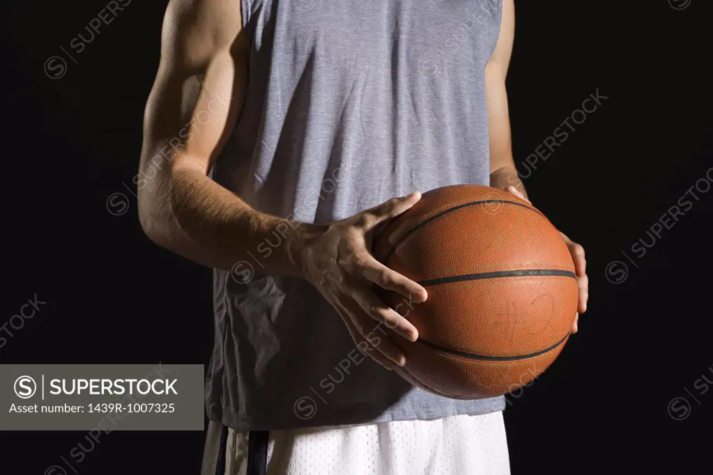 Man holding a basketball
