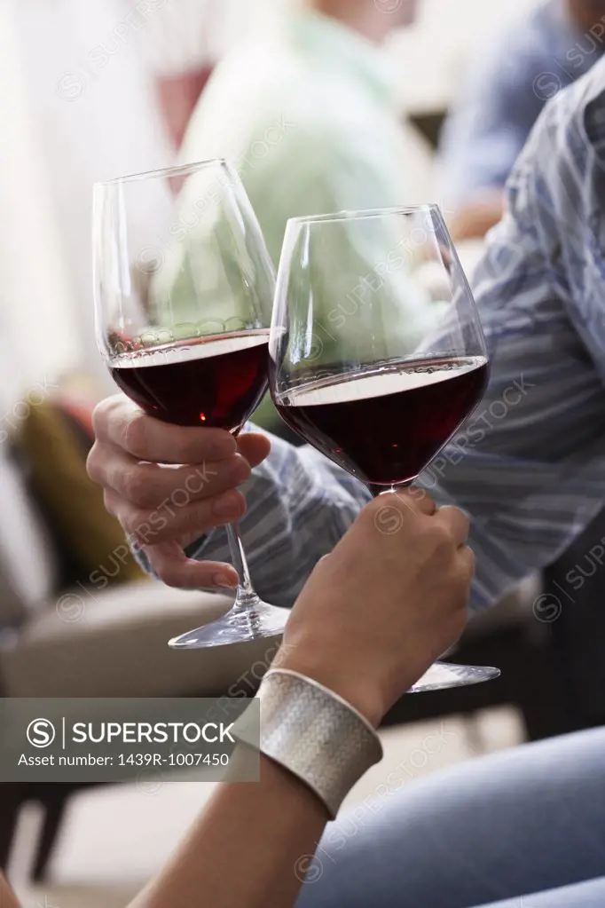 Couple having red wine