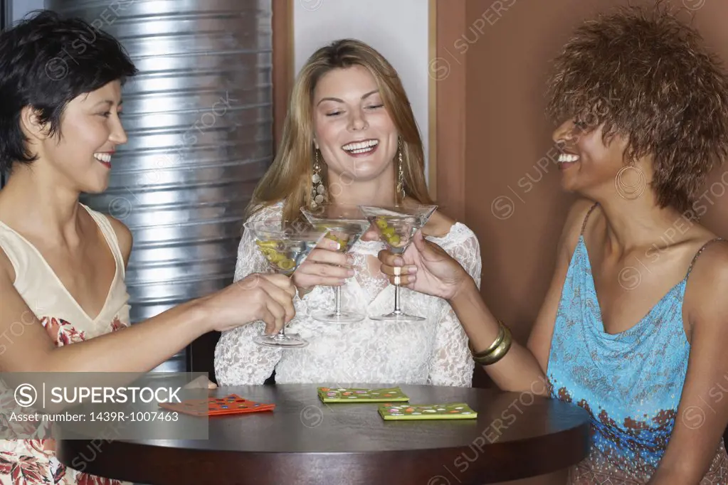 Female friends having cocktails