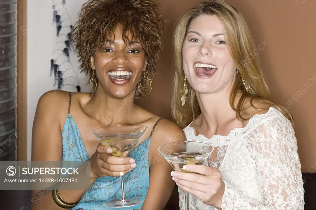Friends enjoying cocktails