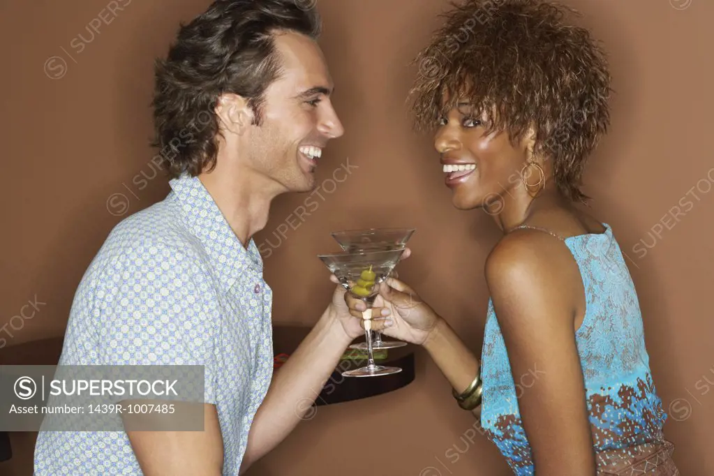 Couple having martinis