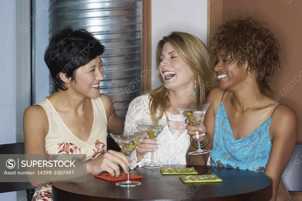 Female friends having cocktails