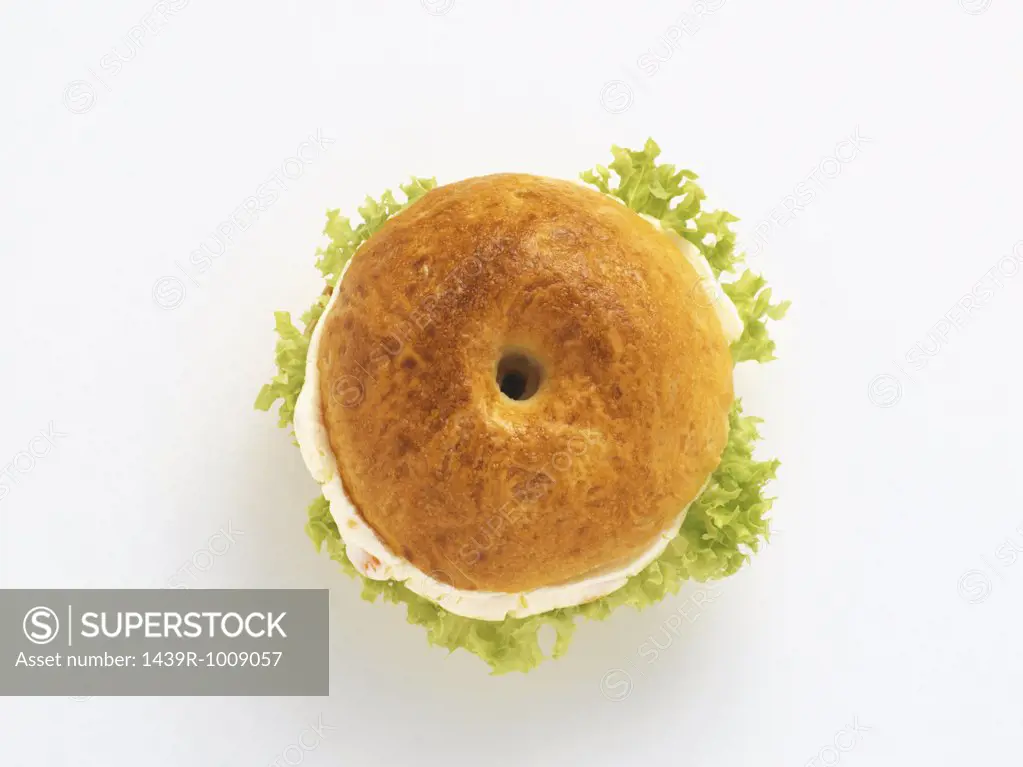 Bagel with cream cheese and salad