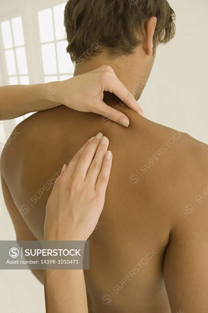 Man having his back massaged